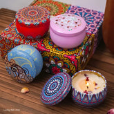 Decorative tin containers with ornate mandala patterns on lids for Arabian pattern fragrance jars